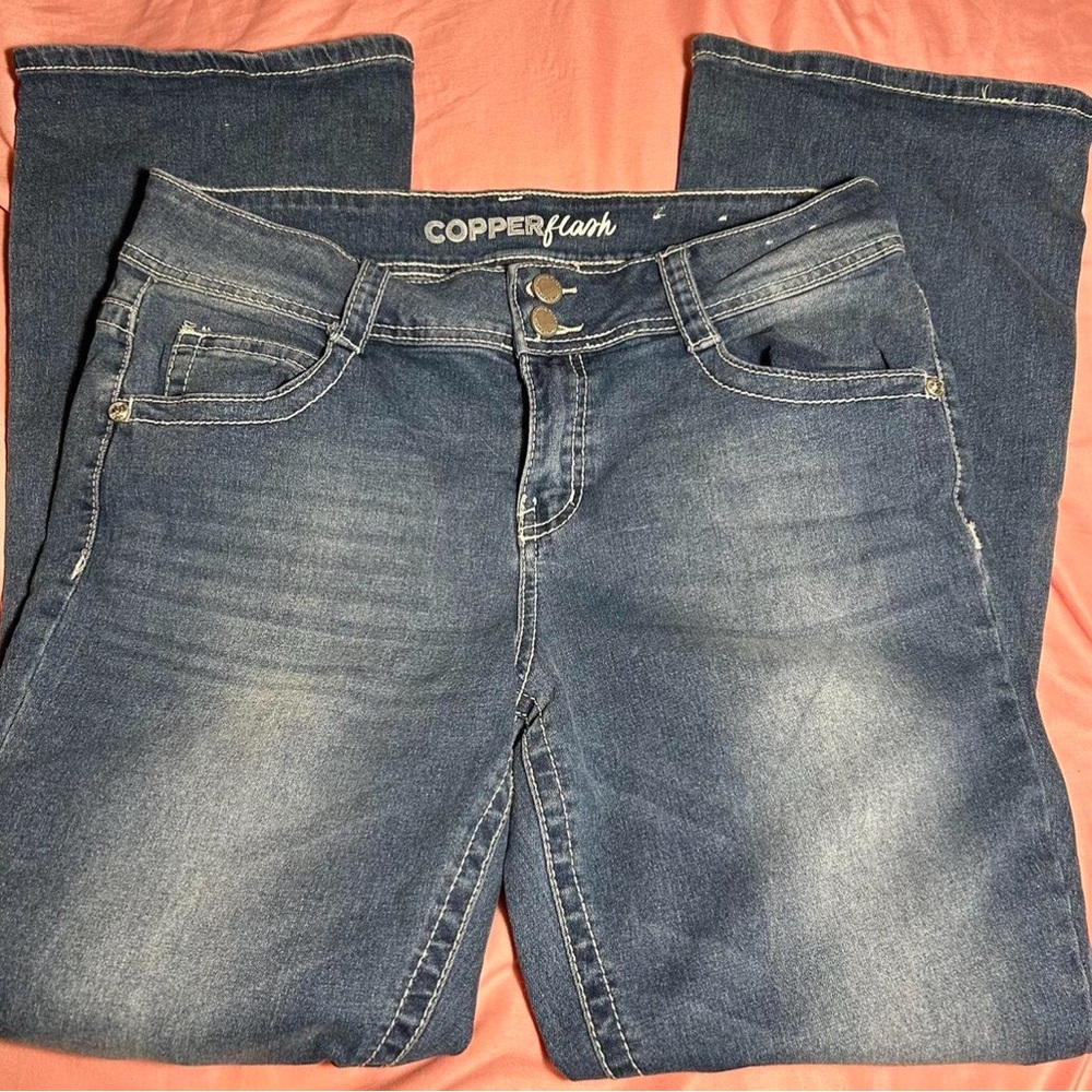 bootcut jeans with design on back pockets